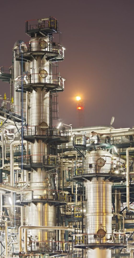 portrait photo of refinery-detail-at-night